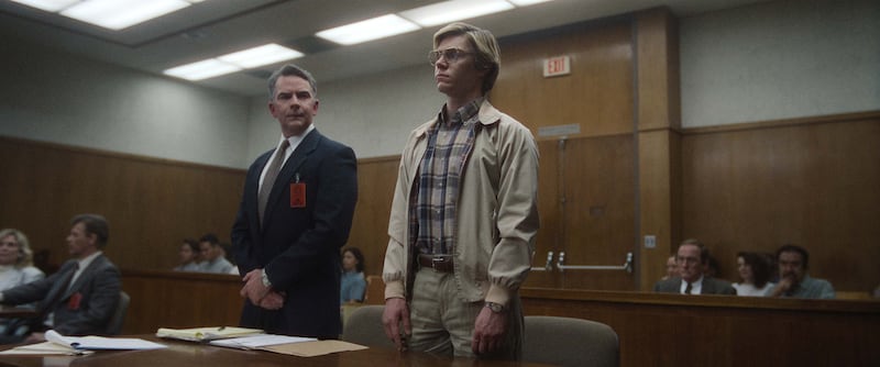 Ron Bush as Jeffrey Dahmer’s lawyer, left, and Evan Peters as Jeffrey Dahmer.