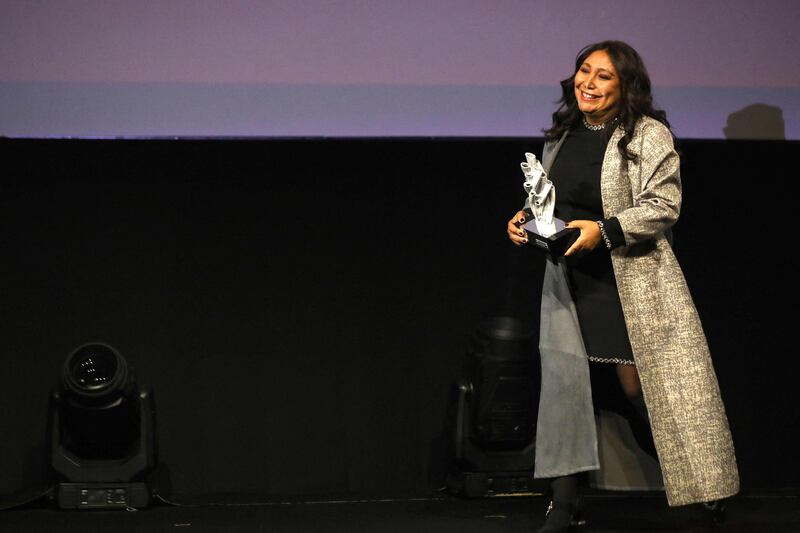 Saudi filmmaker Haifaa Al Mansour receives an honorary award. AFP