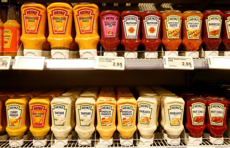 FILE PHOTO: Various Heinz sauces of U.S. food company Kraft Heinz are offered at a supermarket of Swiss retail group Coop in Zumikon, Switzerland December 13, 2016.  REUTERS/Arnd Wiegmann/File Photo  GLOBAL BUSINESS WEEK AHEAD