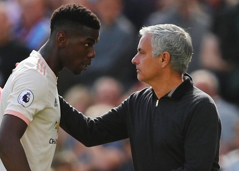 Manchester United's Paul Pogba with manager Jose Mourinho after being substituted against West Ham. Reuters