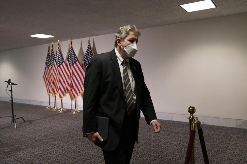 Sen. John Kennedy, a member of the Senate Judiciary Committee, arrives for a rare weekend session to advance the confirmation of Amy Coney Barrett to the Supreme Court, at the Capitol in Washington. AP Photo