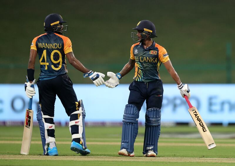 Sri Lanka's Pathum Nissanka, right, celebrates his fifty against Ireland. Chris Whiteoak / The National