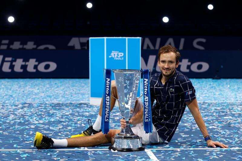 Daniil Medvedev poses with the ATP Finals trophy. Getty Images