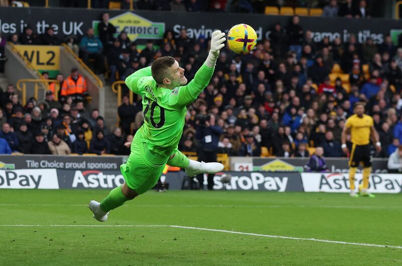 Tottenham goalkeeeper Fraser Forster makes a save. Reuters