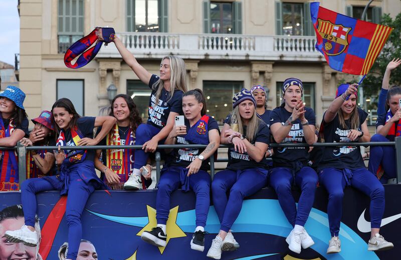 Barcelona's Spanish midfielder Alexia Putellas and the rest of the Barcelona women's team celebrate. AFP