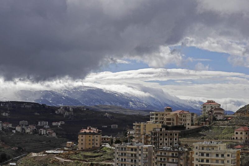 A picture taken on January 26, 2018 from the area of Dahr al-Baidar, east of Beirut, shows the snow-covered Barouk cedar reserve. / AFP PHOTO / JOSEPH EID