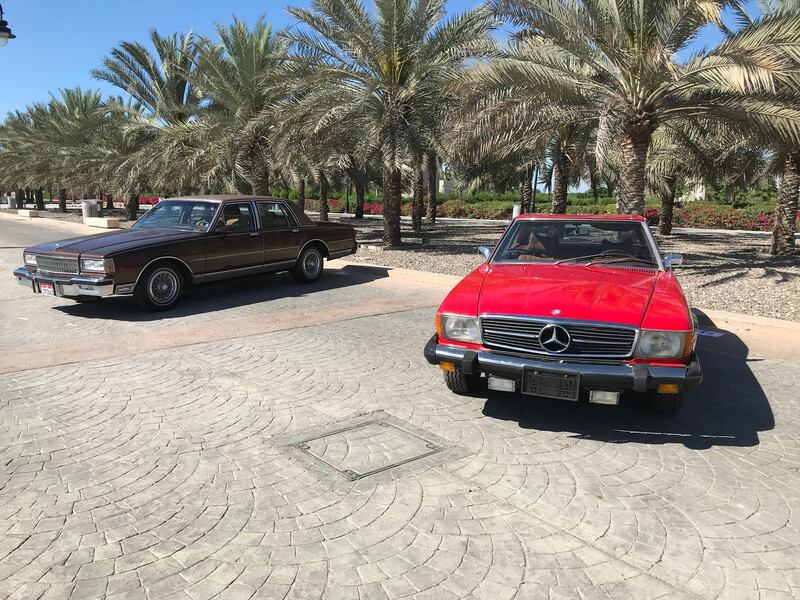 A Mercedes-Benz 450 SL, right, and a Chevrolet Caprice Classic Brougham. Adam Workman / The National