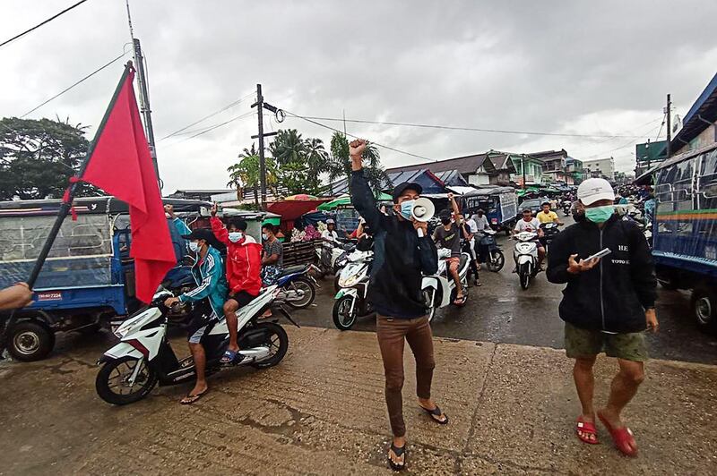 This handout photo taken and released by Dawei Watch on June 14, 2021 shows protesters taking part in a demonstration against the military coup in Dawei. -----EDITORS NOTE --- RESTRICTED TO EDITORIAL USE - MANDATORY CREDIT "AFP PHOTO / DAWEI WATCH " - NO MARKETING - NO ADVERTISING CAMPAIGNS - DISTRIBUTED AS A SERVICE TO CLIENTS
 / AFP / DAWEI WATCH / Handout / -----EDITORS NOTE --- RESTRICTED TO EDITORIAL USE - MANDATORY CREDIT "AFP PHOTO / DAWEI WATCH " - NO MARKETING - NO ADVERTISING CAMPAIGNS - DISTRIBUTED AS A SERVICE TO CLIENTS
