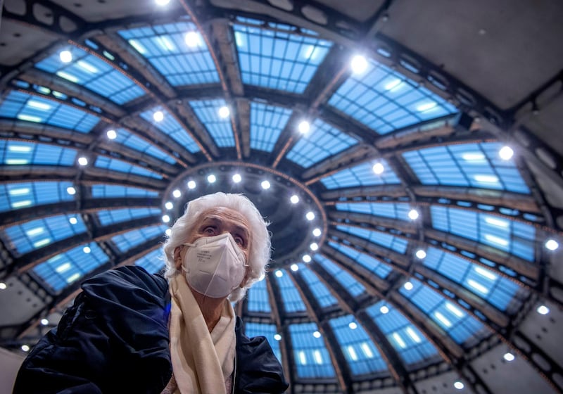 After receiving her vaccination against the novel coronavirus, 90 yearold Odores sits under the domed roof of the vaccination centre in the Festhalle in Frankfurt, Germany. AP Photo