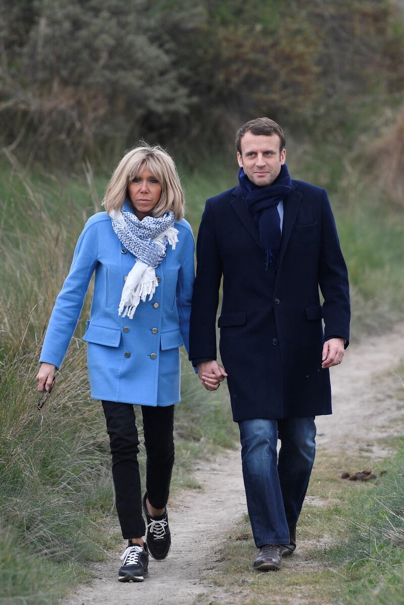 Brigitte, wearing a blue coat and scarf, on April 22, 2017. AFP