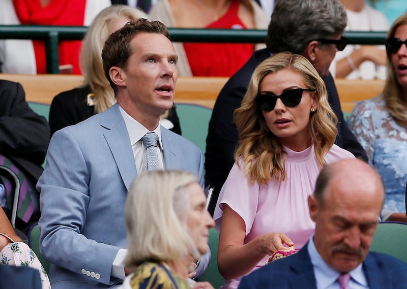Actor Benedict Cumberbatch and singer Katherine Jenkins in the Royal Box ahead of the final between Switzerland's Roger Federer and Serbia's Novak Djokovic REUTERS/Andrew Couldridge