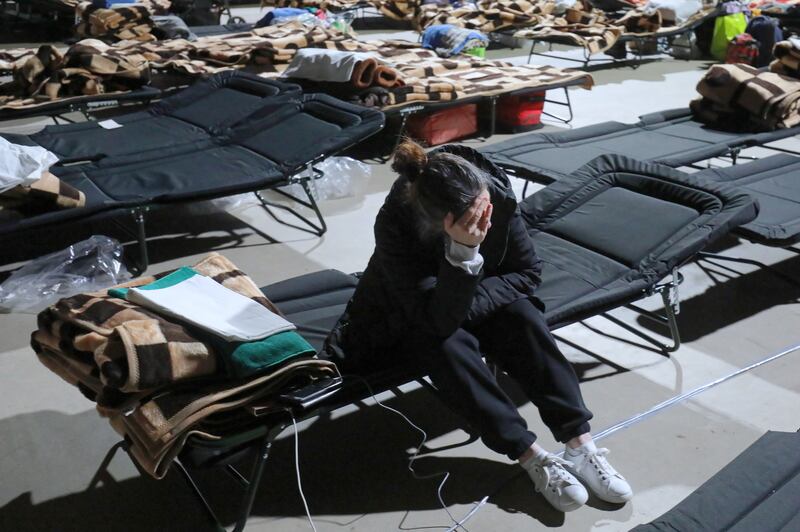 War refugees from Ukraine at the assistance point organised at the Torwar sports hall in Warsaw, Poland. EPA