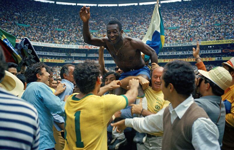 Pele celebrates after Brazil win the 1970 World Cup, in Mexico. Getty Images