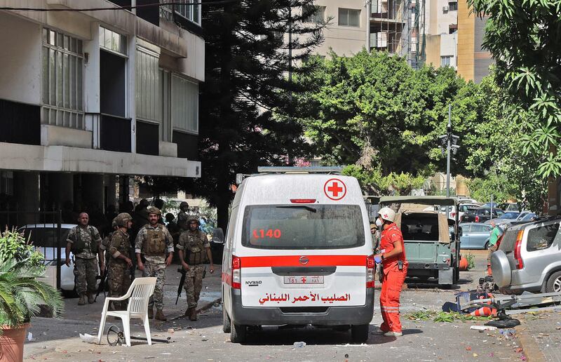 Lebanese soldiers and medics gather in the area. AFP