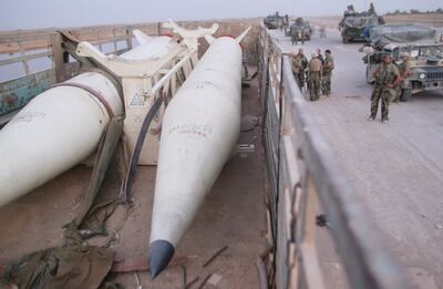 Two Iraqi Scud missiles sit in the back of a tractor trailer after U.S. Marines from Task Force Tarawa secured the trailer found on a highway April 5, 2003 in central Iraq. Getty Images