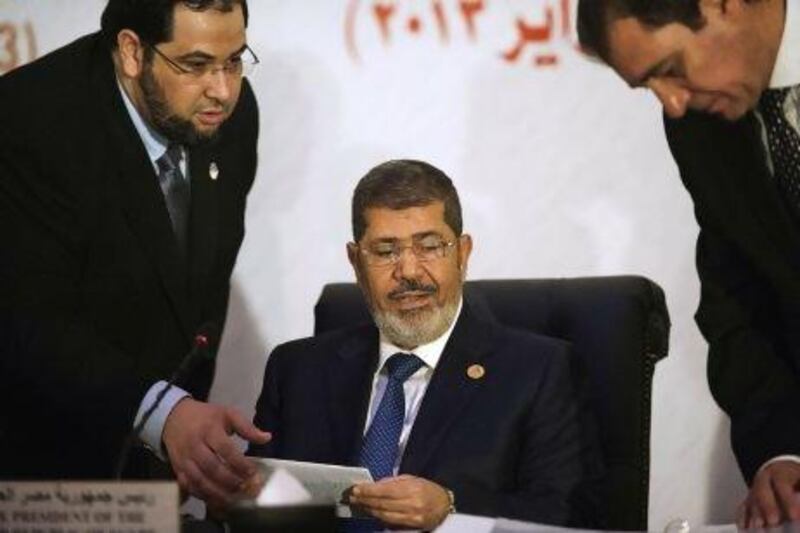 Egyptian president Mohammed Morsi at the 12th summit of the Organisation of Islamic Cooperation in Cairo. Syria’s war was the central issue on the first day of the summit.