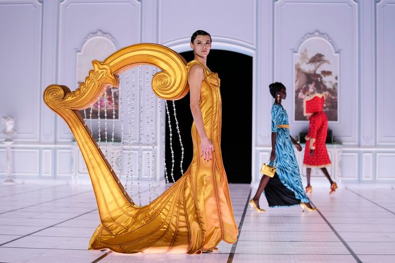 A harp-inspired creation as part of the Moschino autumn/winter 2022 collection. AP Photo