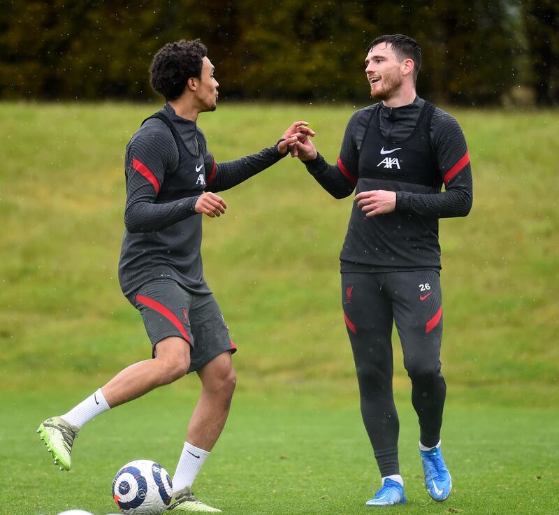 KIRKBY, ENGLAND - MAY 21: (THE SUN OUT, THE SUN ON SUNDAY OUT) Trent Alexander-Arnold and Andy Robertson of Liverpool during a training session at AXA Training Centre on May 21, 2021 in Kirkby, England. (Photo by Andrew Powell/Liverpool FC via Getty Images)