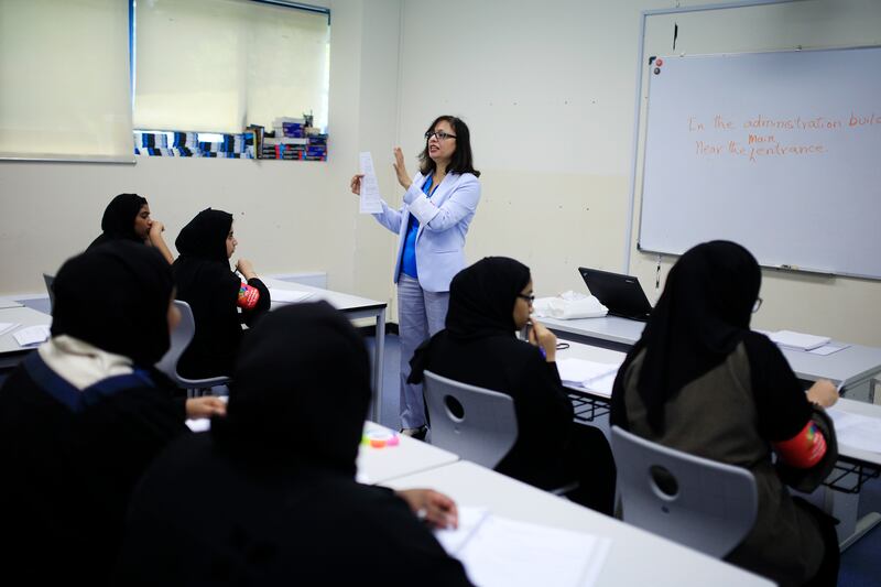 DUBAI, UAE. July 16, 2014 - Stock photograph of female Emirati students attending a phase 1 sales class as part of the YES program at the Institute of Applied Technology in Dubai, July 16, 2014. (Photos by: Sarah Dea/The National, Story by: Hareth Al Bustani, Focus)
