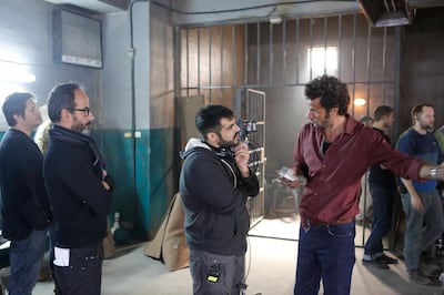 A handout photo of Ben Ross, producer Rami Yasin, Emirati filmmaker Majid Al Ansari and actor Ali Suliman on the set of "Zinzana" (Courtesy: Image Nation) *** Local Caption ***  al15ja-zinzana.JPG