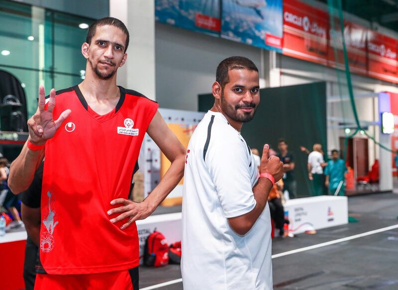 Dubai, U.A.E., June 25, 2018.  Special Olympics is launching a summer camp at Dubai Sports World for young people with intellectual disabilities at Hall 2, World Trade Centre.
(L-R) Khalid Al Manie and Mubarak Barooki Al Darmaki of the U.A.E. Special  Olympics basketball team.
Victor Besa / The National
Section:  NA
Reporter:  Ramola Talwar