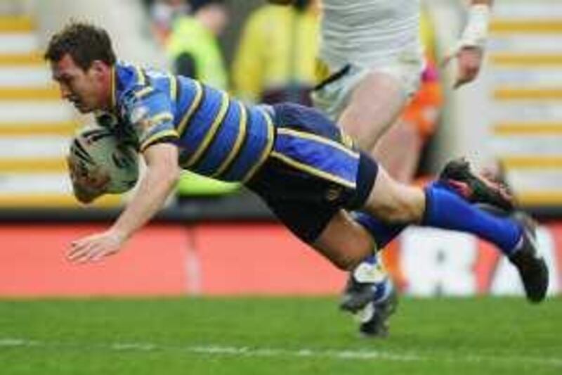 WARRINGTON, UNITED KINGDOM - MARCH 08:  Danny McGuire of Leeds scores a try during the engage Super League match between Warrington Wolves and Leeds Rhinos at the Halliwell Jones Stadium on March 8, 2009 in Warrington, England.  (Photo by Matthew Lewis/Getty Images)