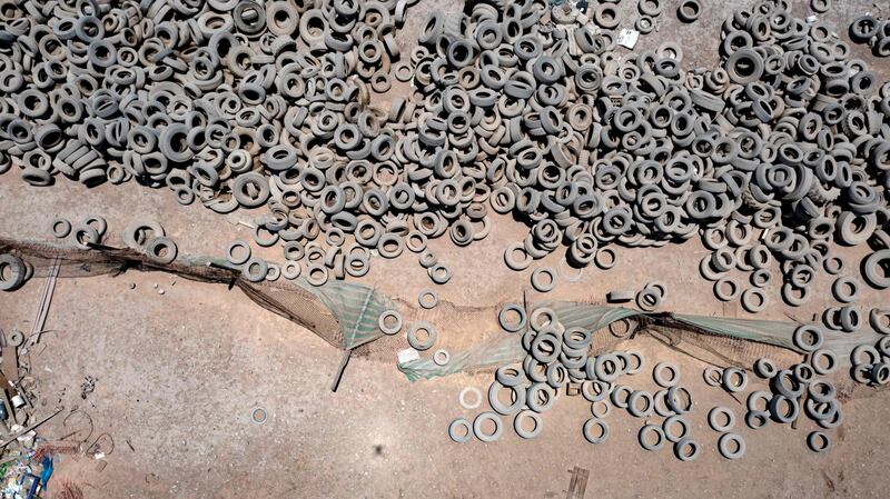 Hundreds of tyres are piled on the side of a highway, about 1,380 km from Santiago, Chile. Mountains of used clothes from the US, Asia and Europe, old cars from Japan or Korea and thousands of tyres contaminate vast areas of the immense but vulnerable Atacama desert in northern Chile, which has become the planet's "backyard". AFP