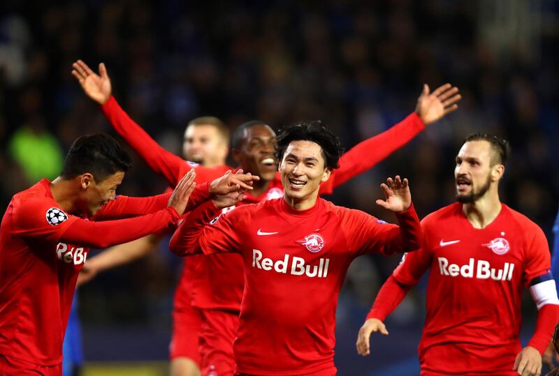 Takumi Minamino after scoring Salzburg's second goal during the Champions League match against Genk. Getty Images