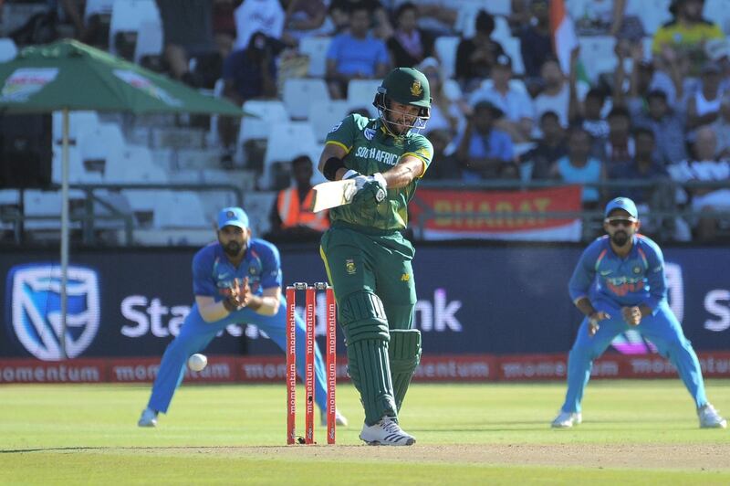 South Africa's JP Duminy plays a shot during the One Day International (ODI) cricket match between India and South Africa at Newlands stadium on February 7, 2018 in Cape Town.  / AFP PHOTO / RODGER BOSCH