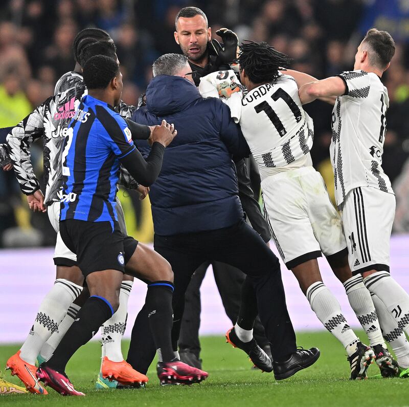 Players of Juventus and Inter argue at the end of their Coppa Italia semi-final first leg. EPA