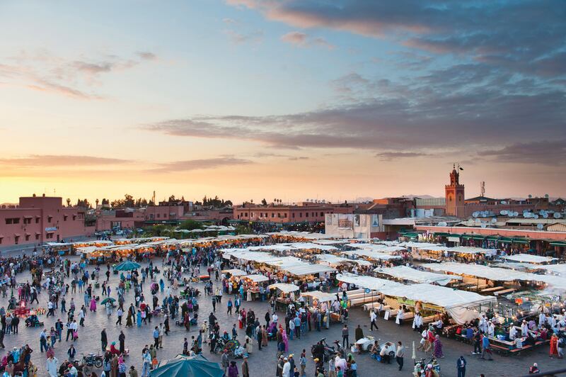14. The Djemaa El Fna in Marrakesh, Morocco is one of many landmarks that families can visit. Photo: Corbis

