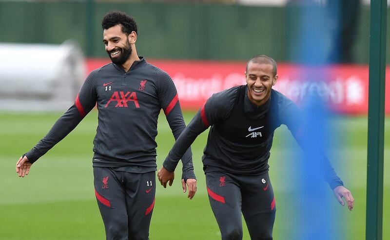 LIVERPOOL, ENGLAND - OCTOBER 13: (THE SUN OUT. THE SUN ON SUNDAY OUT) Mohamed Salah of Liverpool with Thiago Alcantara of Liverpoolduring a training session at Melwood Training Ground on October 13, 2020 in Liverpool, England. (Photo by John Powell/Liverpool FC via Getty Images)