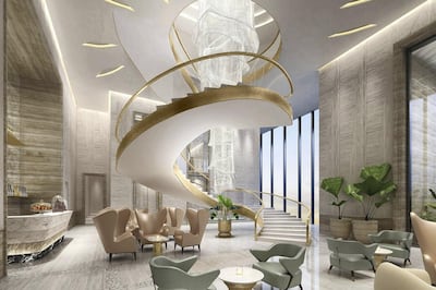 The grand staircase in the lobby of The St Regis Dubai, The Palm is inspired by the staircase built in 1904 at the first St Regis in New York City. Courtesy St Regis 