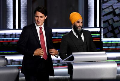 Canadian Prime Minister Justin Trudeau and NDP leader Jagmeet Singh take part in an election debate in Gatineau, Canada, in 2021. Reuters