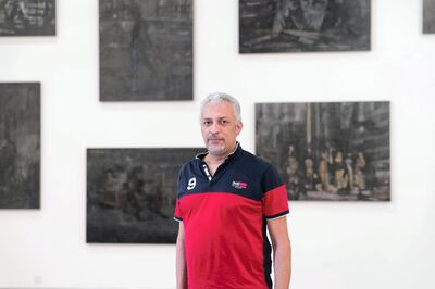 DUBAI, UNITED ARAB EMIRATES - SEPTEMBER 27, 2018. 

Mohammed Kazem infront of his series "Even the Shade does not Belong to Them" at his solo show "A Prime Activity", in Gallery Isabelle van den Eynde. 

The show focuses on his paintings – a relatively unknown aspect of his practice. Kazem has been painting since his late teens and early 20s, went on to win the first prize in painting at Muscat Youth Biennial in 1990 and loved the surface so much that he remained consciously aware to the inspiration coming from the medium itself.

While painting remained a major aspect of Kazem’s early practice, now more than 30 years later, he is still fascinated by collecting and documenting information about unimportant objects and traces of our present within a particular environment. In his monograph published in 2013, Hassan Sharif wrote, “The meaning or purpose of his [Kazem’s] paintings lies in the life of the colours and the ways they can be put to use, not in the painted objects themselves.” 


(Photo by Reem Mohammed/The National)

Reporter: Melissa Gronlund
Section: AC