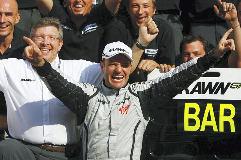 MONZA, ITALY - SEPTEMBER 13:  Rubens Barrichello of Brazil and Brawn GP celebrates with team mates in the paddock after winning the Italian Formula One Grand Prix at the Autodromo Nazionale di Monza on September 13, 2009 in Monza, Italy.  (Photo by Clive Rose/Getty Images)