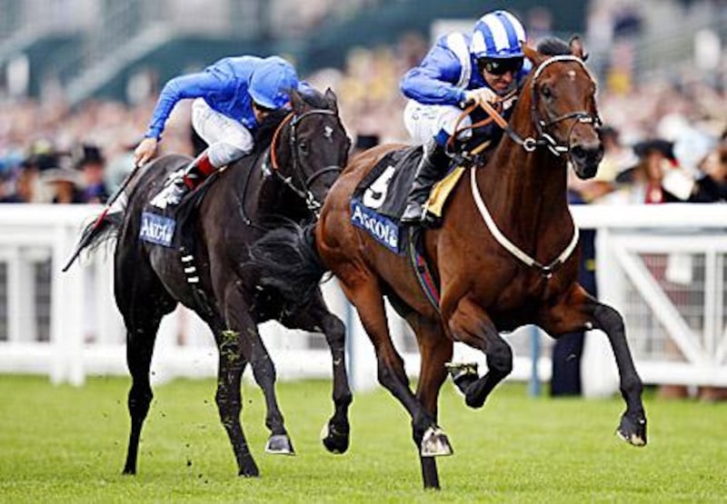 Richard Hills on Aqlaam, right, fought off a strong field in the Summer Miles Stakes at Ascot.