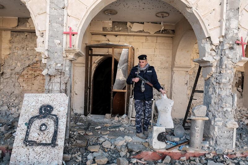 Qaraqosh, December 27 2016 Burned and devastated Church of St Mary al-Tahira. Makeshift shooting range of jihadists.The offensive to retake Iraqs second city from Islamic State of Iraq and the Levant (Isil) began in mid-October.Shortly afterwards, Iraqi forces and local militias succeeded in driving Isil out of the historic Christian town of Qaraqosh on Iraqs Nineveh plain, 10 miles east of Mosul, which was captured by the jihadist group in the summer of 2014.  Destruction is bad enough, though it is not total. Isis fighters set fire to many ordinary houses in addition to the churches in the days before they left, but  possibly because there was no furniture left to burn since it all had been looted  most of these houses look as if they could be made habitable after extensive repairs. (Photo by Maciej Moskwa/NurPhoto via Getty Images)