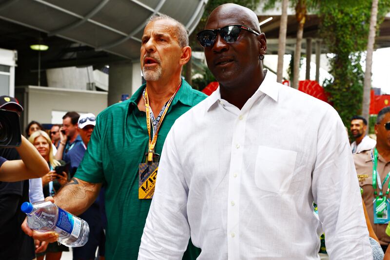 Basketball legend Michael Jordan walks in the paddock prior to the F1 Grand Prix of Miami. Getty
