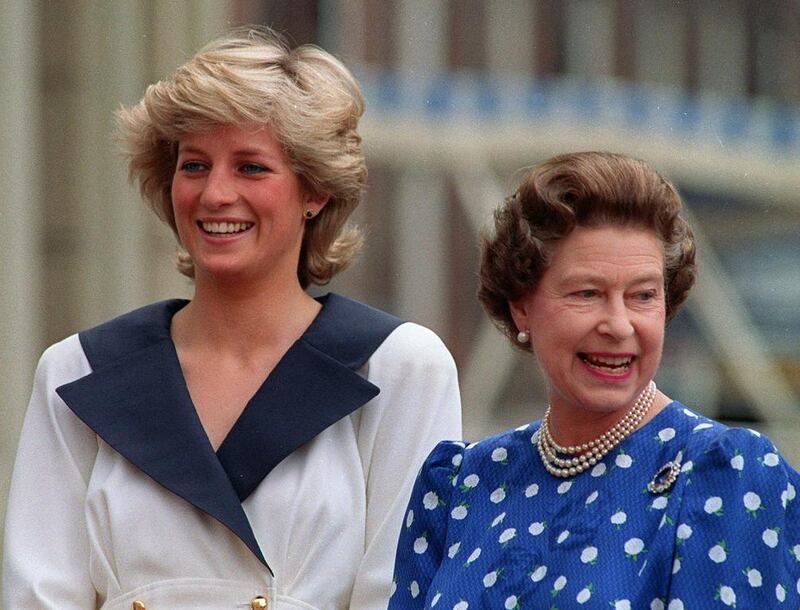 Diana, Princess of Wales, left, and Britain’s Queen Elizabeth II as they smile to well-wishers outside Clarence House in London on August 4, 1987. Martin Cleaver / AP photo