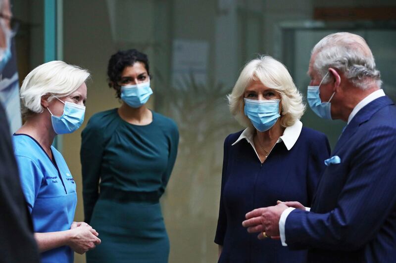 Prince Charles and Camilla speak to Chief Nursing Officer for England Ruth May at Skipton House. AP Photo