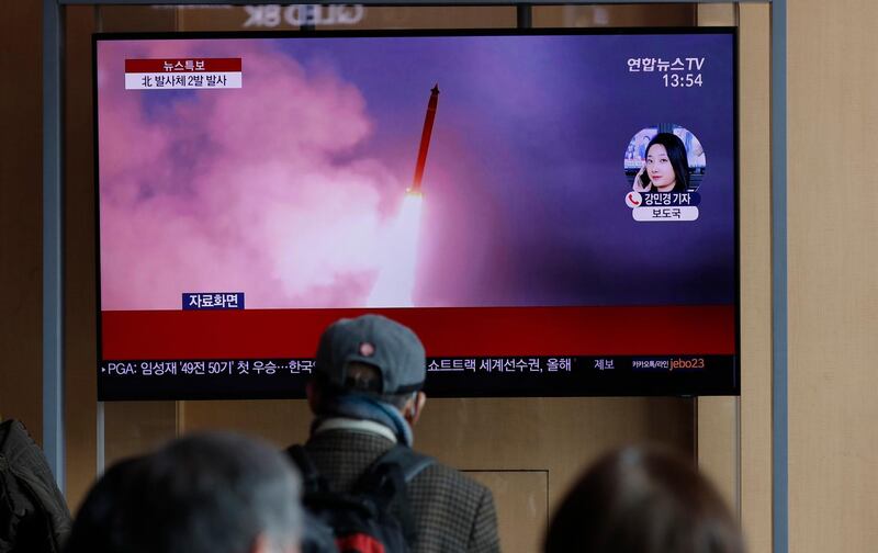 People watch a news programme reporting Pyongyang firing projectiles in Seoul, South Korea. AP