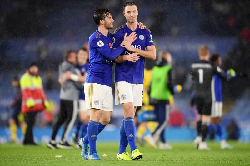 Leicester City players Ben Chilwell and Jonny Evans celebrate at full-time following the win over Arsenal. Getty Images