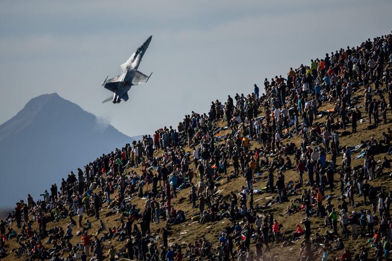 A McDonnell Douglas F/A-18 Hornet of the Swiss Air Force during the annual live fire event over the Axalp in the Bernese Oberland. At 2,200 metres above sea level, spectators watched an aviation display at the highest air force firing range in Europe.  AFP