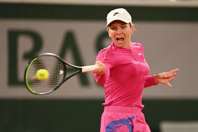 PARIS, FRANCE - SEPTEMBER 27: Simona Halep of Romania plays a forehand during her Women's Singles first round match against Sara Sorribes Tormo of Spain during day one of the 2020 French Open at Roland Garros on September 27, 2020 in Paris, France. (Photo by Shaun Botterill/Getty Images)