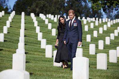 Britain's Prince Harry and Meghan, Duchess of Sussex visit the Los Angeles National Cemetery in honour of Remembrance Sunday, in Los Angeles, California, U.S., November 8, 2020.  LEE MORGAN/Handout via REUTERS THIS IMAGE HAS BEEN SUPPLIED BY A THIRD PARTY. MANDATORY CREDIT. NO RESALES. NO ARCHIVES.