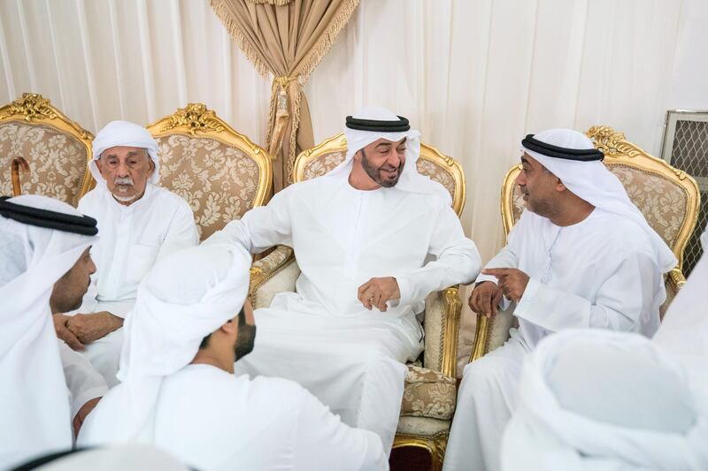 DIBBA, FUJAIRAH, UNITED ARAB EMIRATES - September 16, 2019: HH Sheikh Mohamed bin Zayed Al Nahyan, Crown Prince of Abu Dhabi and Deputy Supreme Commander of the UAE Armed Forces (C), offers condolences to the family of martyr Warrant Officer Ali Abdullah Ahmed Al Dhanhani.

( Hamad Al Kaabi / Ministry of Presidential Affairs )​
---