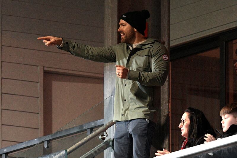 Wrexham owner Ryan Reynolds watches the action. AFP