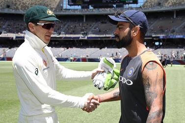 Australia captain Tim Paine with Indian counterpart Virat Kohli. Getty Images
