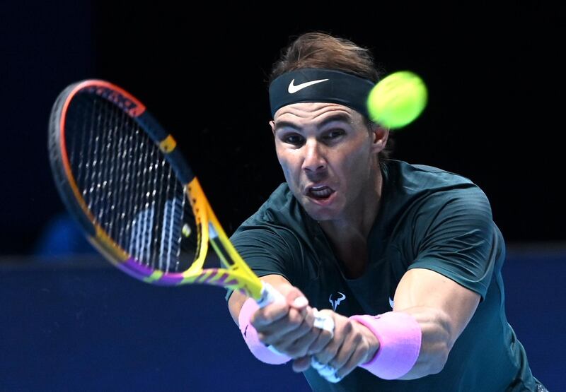 Rafael Nadal of Spain returns to Andrey Rublev of Russia during their group stage match at the ATP Finals in London. EPA